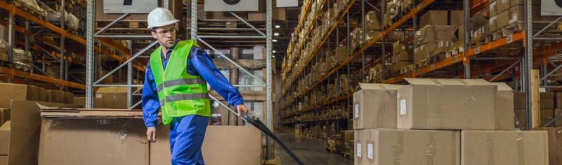 Man working in warehouse crop